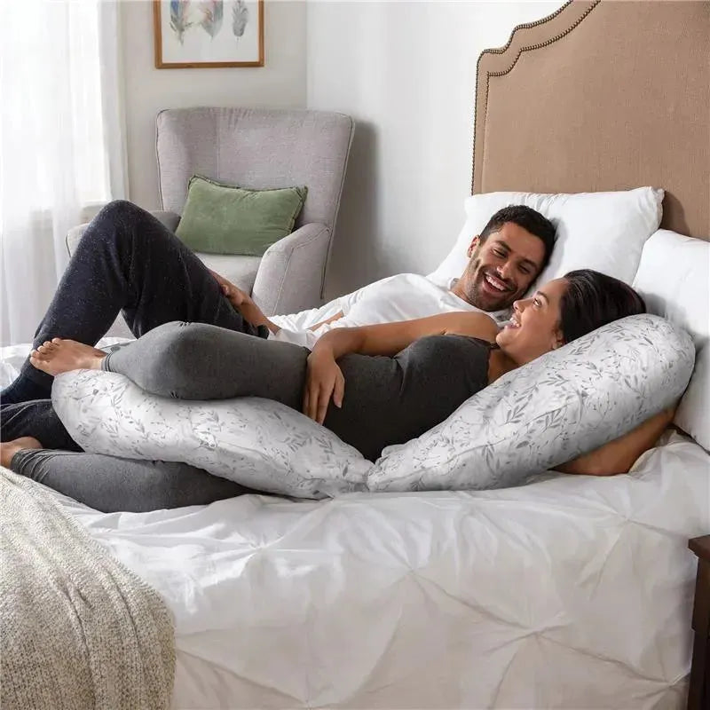 https://www.es.macrobaby.com/cdn/shop/files/boppy-slipcovered-total-body-pregnancy-pillow-gray-scattered-leaves_image_11.jpg?v=1699463870