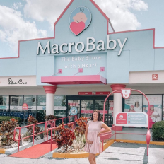 Mom in front of Baby Store in Orlando, FL 