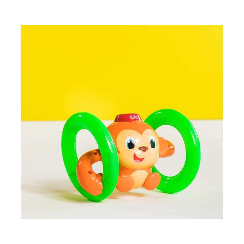 https://www.es.macrobaby.com/cdn/shop/files/kids-ii-bright-starts-roll-glow-monkey-crawling-baby-toy_image_3.jpg?v=1697047795