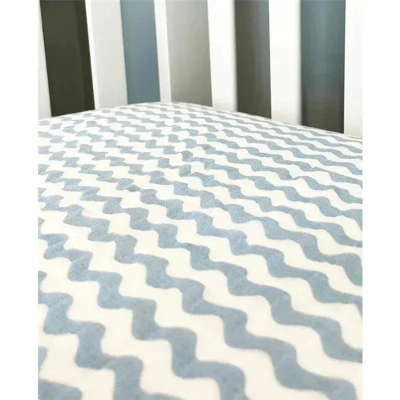 Rose Textiles - Wave Muslin Crib Sheet, Blue Image 1